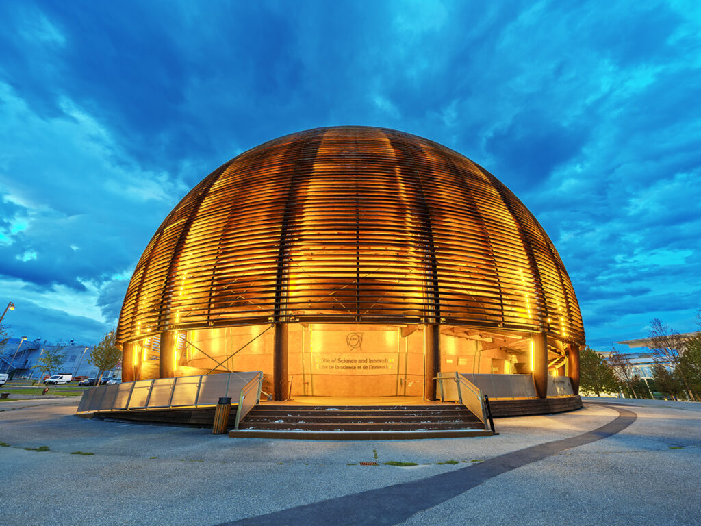 GENEVA, SWITZERLAND - OCTOBER 3, 2023: Cern Visitor Center at blue hour. The research center operates the largest particle physics laboratory in the world.